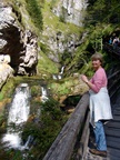 The water cascades from the water hole spring